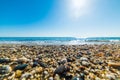 Sun shining over Perdepera beach Royalty Free Stock Photo