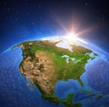 Sun shining over The United States of America USA and Canada from space Royalty Free Stock Photo