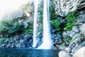 Sun shining to the Joengbang waterfall in Seogwipo, Jeju Island, South Korea Royalty Free Stock Photo