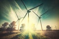 the sun shining through the wind turbines of a green energy park Royalty Free Stock Photo