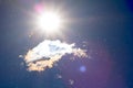 Sun in the sky with cloud and bird and pollen Royalty Free Stock Photo