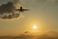 Sun and sunset with aircraft landing