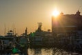 Sun At Sunset and Cityscape in a Torrid Day. Destin Beach, Florida