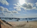 The sun before sunset and fishing boats at Kedonganan beach Bali Royalty Free Stock Photo