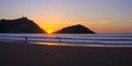 Sun at sunset in front of La Concha beach in the city of Donostia, San Sebastian, Euskadi