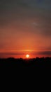 sun sunset sky Beautiful Cool orange  dark tree Royalty Free Stock Photo