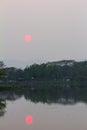 Landscape view of the Sun that on the surface of the water.