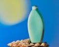 Sun tan lotion in a blue bottle. Royalty Free Stock Photo