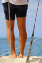 Sun tanned legs on a yacht