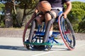 Sun-tanned man in sports wheelchair Royalty Free Stock Photo