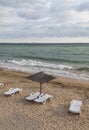 Sun umbrella on empty sea beach