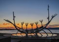 Sun Voyager iconic symbol of Reykjavik at sunset: Sculpture of viking ship on harbor, Reykjavik, Iceland