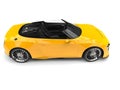Sun yellow modern convertible sports car - side view Royalty Free Stock Photo