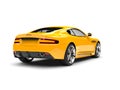 Sun yellow modern sports luxury car - rear view Royalty Free Stock Photo