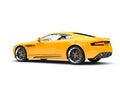 Sun yellow modern sports luxury car - tail view