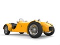 Sun yellow vintage open wheel sports racing car Royalty Free Stock Photo