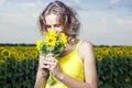 Sun young girl in the field with sunflowers Royalty Free Stock Photo