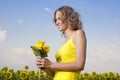 Sun young girl in the field with sunflowers Royalty Free Stock Photo