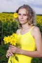 Sun young girl in the field with sunflowers Royalty Free Stock Photo