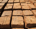 Sunbaked Clay Bricks Drying in the Sun Rural Texture soil aged wall brown earth adobe Royalty Free Stock Photo