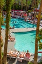 Sunbathers at the Flamingo Hilton hotel & resort pool Royalty Free Stock Photo