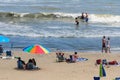 Sunbathers on the sand at Virginia Beach, VA.