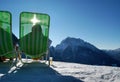 Sunbathers on wintry mountain