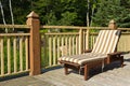 Sunbathing chair on a wooden deck
