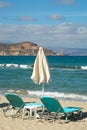 Sunbathing chairs on a beach in Greece