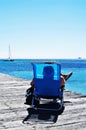 Sunbathing on a dock in the Mediterranean sea Royalty Free Stock Photo