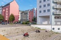 Sunbathing lawn at Kieler Eck and people enjoying the sun in Berlin, Germany