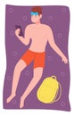 Sunbathing person. Guy laying on beach towel with smartphone Royalty Free Stock Photo