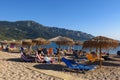 Sunbathing sandy Mediterranean beach Corfu, Greece