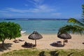 Sunbathing vacation at a luxury resort in Le Morne Beach, Mauritius Royalty Free Stock Photo