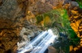 Sunbeam through ceiling hole in Dau Go cave in Ha long Bay