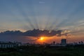 Sunbeam through the dramatic cloud during sunset time,