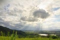 Sunbeam over lake and mountain in Khao Kho District Royalty Free Stock Photo