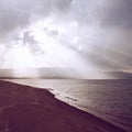 Sunbeam through the sea with retro effect Royalty Free Stock Photo