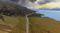 Sunbeam view with mountain range near Aoraki Mount Cook and the road leading to Mount Cook Royalty Free Stock Photo