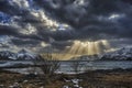 Sunbeams through clouds Royalty Free Stock Photo