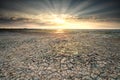 Sunbeams over Wadden sea coast