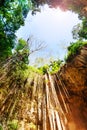 Sunbeams penetrating at Ik-Kil cenote in Mexico