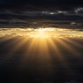 Sunbeams pierce through layers of dark clouds, creating dramatic, golden rays against the sky. Royalty Free Stock Photo