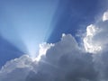 Sunbeams piercing the leaden clouds Royalty Free Stock Photo