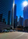 Sunbeams reflect off of a reflective building on upper Wacker Drive in the Chicago Loop.