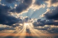 Sunbeams shine through cumulus clouds, a stunning natural phenomenon scene