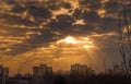 Sunbeams shining through a break in the clouds Royalty Free Stock Photo