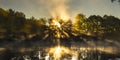 Sunbeams and steamy river