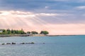 Sunbeams or sun rays at a sunrise on a beach in Sunny Beach on the Black Sea coast of Bulgaria