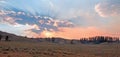 Sunbeams and sunrays through sunset clouds in the Hayden Valley in Yellowstone National Park in Wyoming Royalty Free Stock Photo